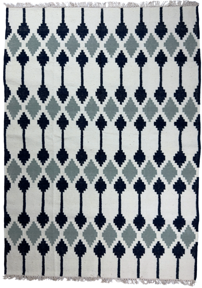 Patterned rug with geometric design on a white background