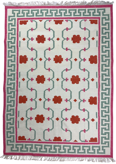 Decorative rug with geometric pattern on a white background