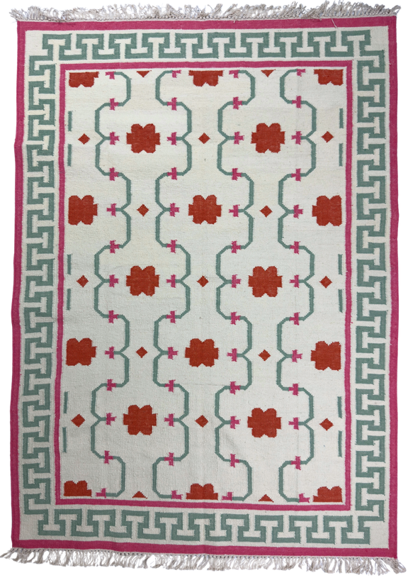 Decorative rug with geometric pattern on a white background