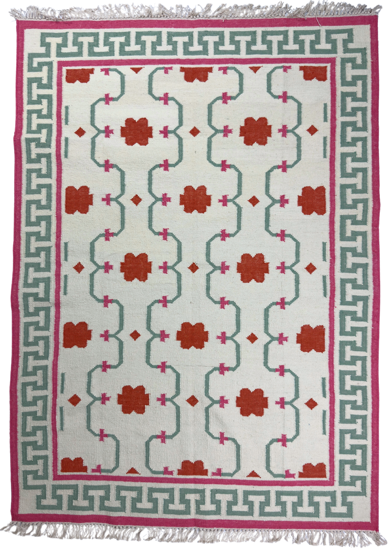 Decorative rug with geometric pattern on a white background