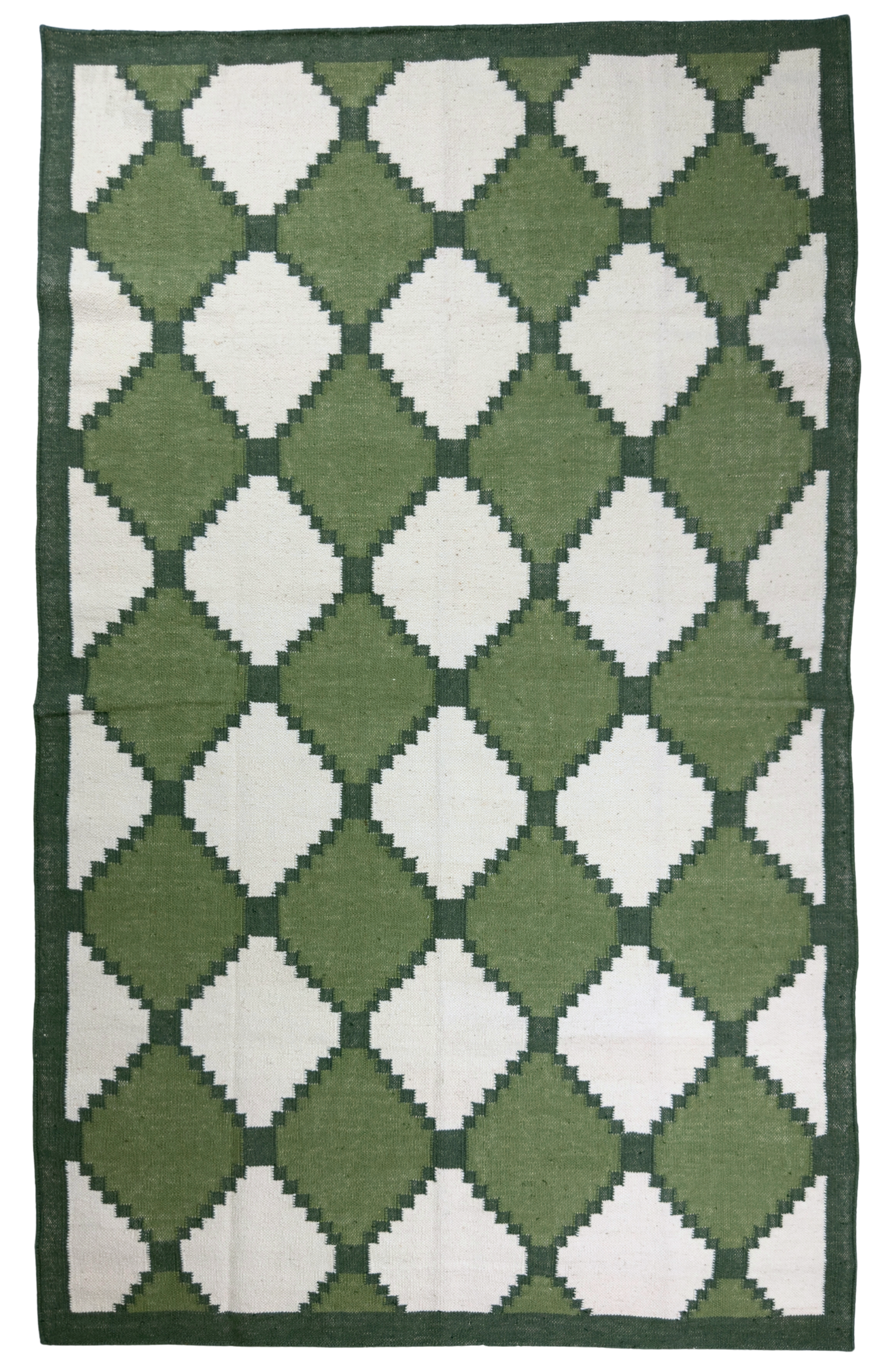 Green and white diamond patterned rug