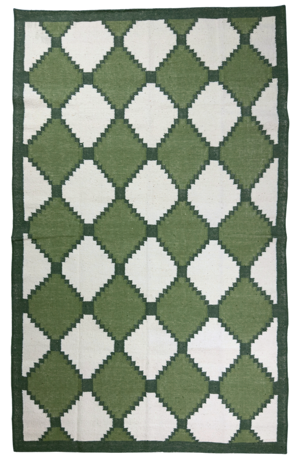 Green and white diamond patterned rug