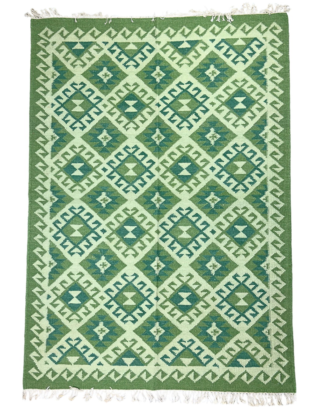 Green and white patterned rug with geometric design background