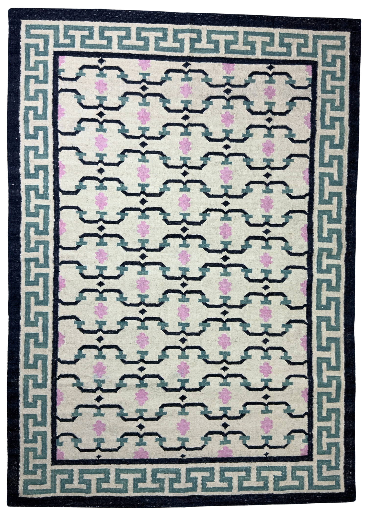 Patterned rug with geometric design on a white background