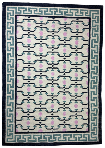 Patterned rug with geometric design on a white background