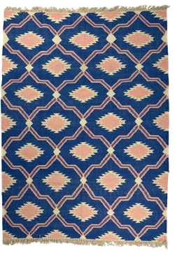 Rug with geometric pattern on a blue background