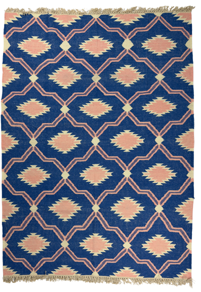 Rug with geometric pattern on a blue background