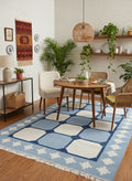 Handwoven blue and white wool rug by Dariyaa